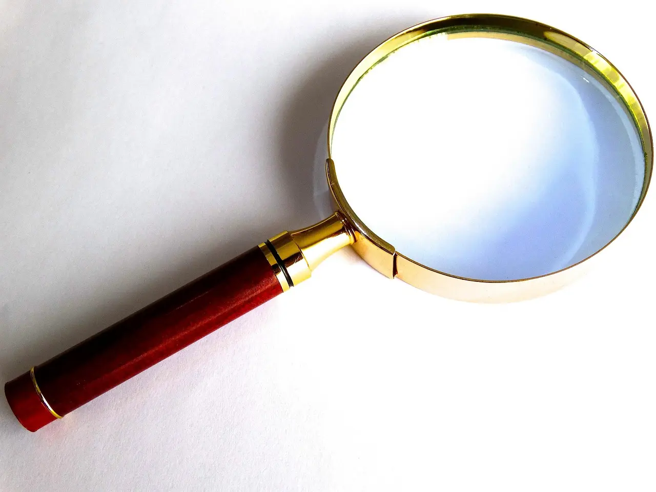 A magnifying glass on a white background